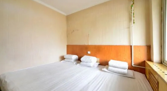 Кровать в общем номере Chunyanggong Hotel