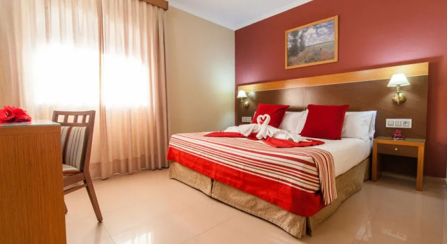 Кровать в общем номере Hotel Regio 2