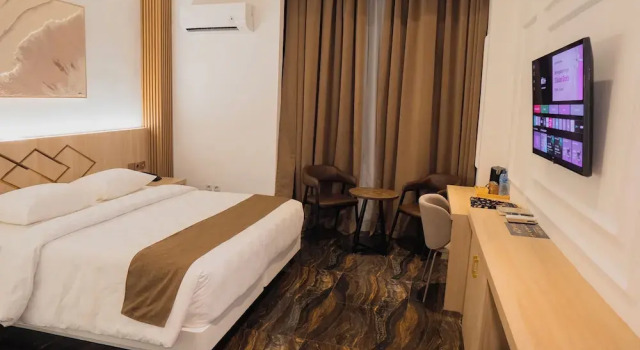 Номер Deluxe Fahira Hotel Syariah Padang