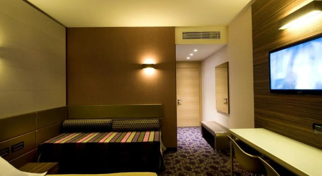 Трёхместный номер Executive Viola Mhotel