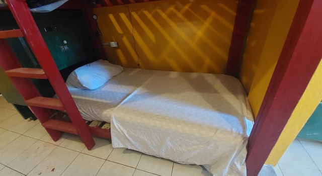 Cama en dormitorio compartido Labrish Guest House