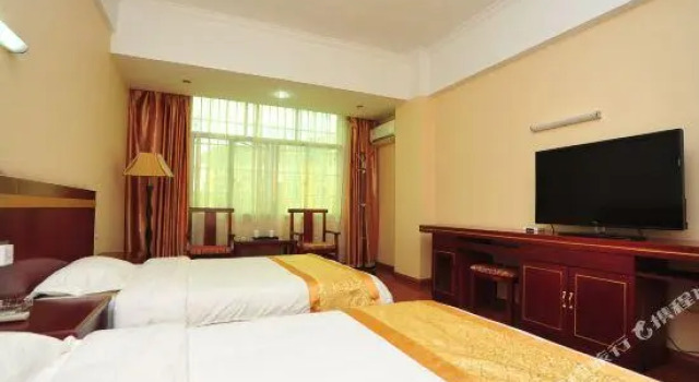 Xishuangbanna Qunyi Business Hotel, Buchen Sie Hotel Hotels in Yunnan mit Parkplatz, Parkplätze
