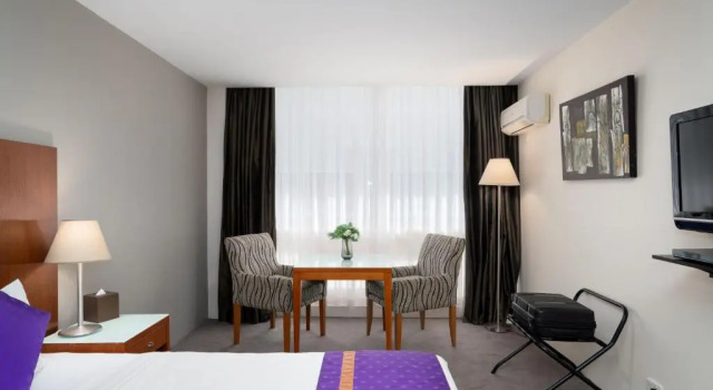 Студия Park Regis Griffin Suites