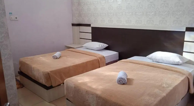 Полулюкс Trivadoh Syariah Hotel
