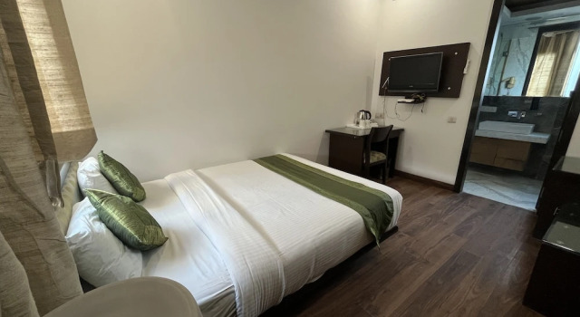 Номер Deluxe Amber Inn by Orion Hotels