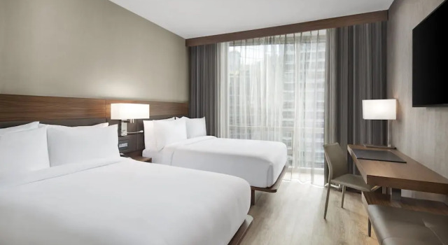 Четырёхместный номер Standard AC Hotel by Marriott Lansing University Area