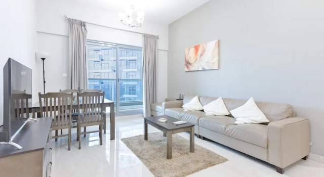 Luxury StayCation - Vibrant 1BR Apartment With Pool and Huge Balcony