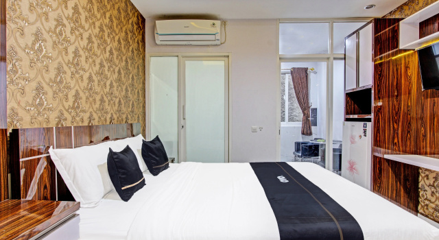 OYO 90253 DHelomi, Book Hotel Depok 