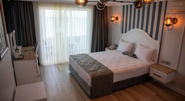 Beyaz Ev Hotel & Restaurant, Забронировать Отель Бостанджиллы Черноморский регион Турции