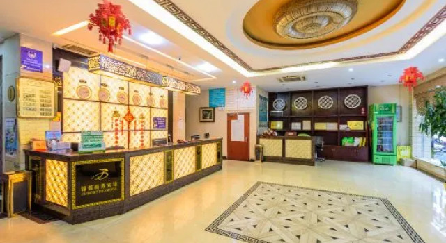 Jindu Business Hotel, Забронировать Отель Хэчи Гуанси-Чжуанский автономный район