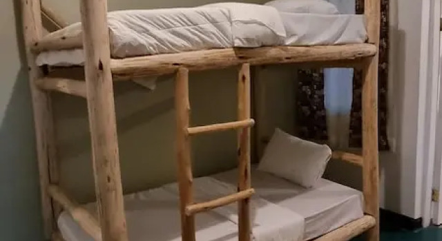 Letto in camerata con balcone Kizumba House