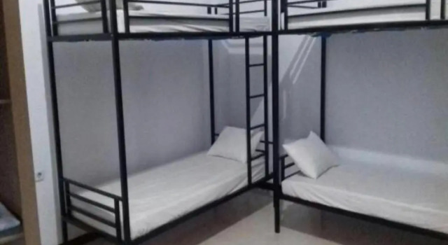 Cama en dormitorio compartido DSAWAH GUESTHOUSE