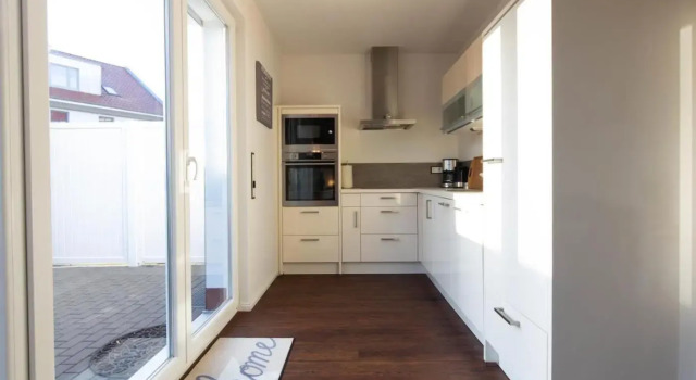Ferienwohnung Ostsee Lounge, Забронировать Отель Шарбойц Holstein Switzerland, рядом с Пляж Hundestrand