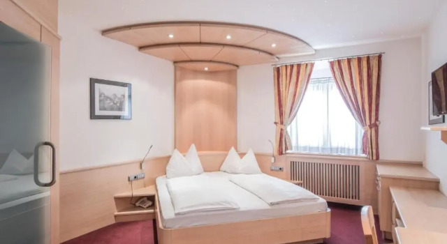 Четырёхместный номер Standard Posthotel Lamm