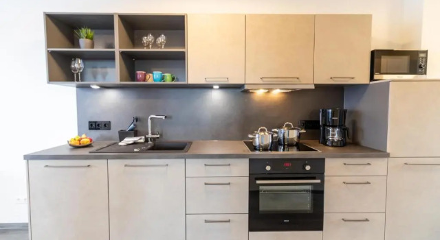 Апартаменты Deluxe Hotel & Apartments Leugermann