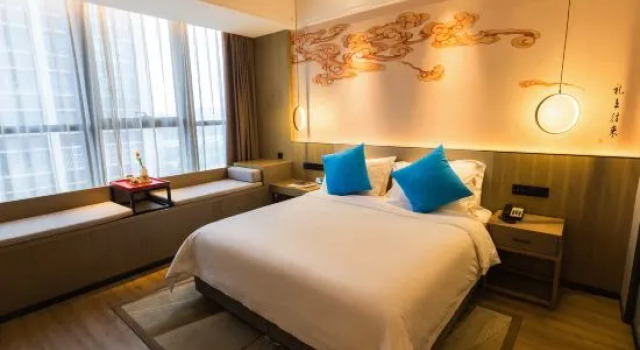 Люкс Мансарда Hotel Shang Jin Li (Hanli culture-themed hotel in Yongcheng)