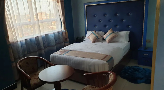 Signature Suites & Hotel