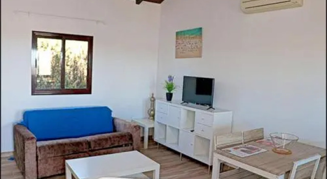Bungalow Ramos II, con piscina compartida, Забронировать Отель Отели Конил-де-ла-Фронтера с парковкой, рядом с Пляж Фуэнте-дель-Галло, Парковка