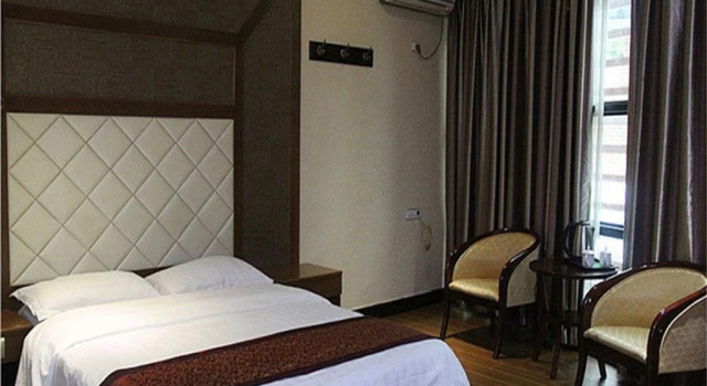 Yujing Business Hotel, Prenota Hotel Huaying Sichuan