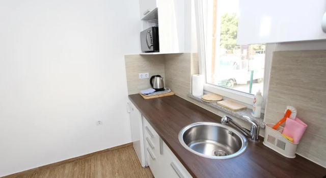 Апартаменты Comfort Цокольный этаж c 1 комнатой с балконом Apartments Hanna