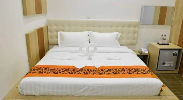 Queen's Land Inn, Rezerwuj Hotel Sawbwagyigon Yangon downtown