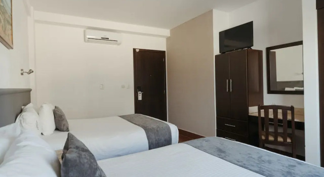 Четырёхместный номер Business Hoteles Unico Express