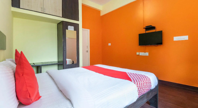 OYO Flagship 71828 HOTEL GURU, Забронировать Отель Бангалор штат Карнатака, рядом с Indian Institute of Management Bangalore