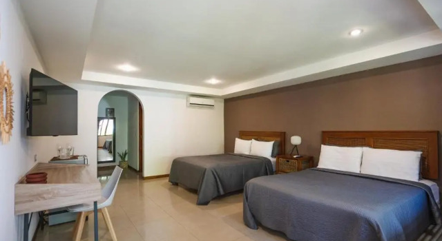 Четырёхместный номер Deluxe Hotel Arco Iris