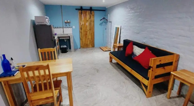 Кровать в общем номере Swartberg Cottages