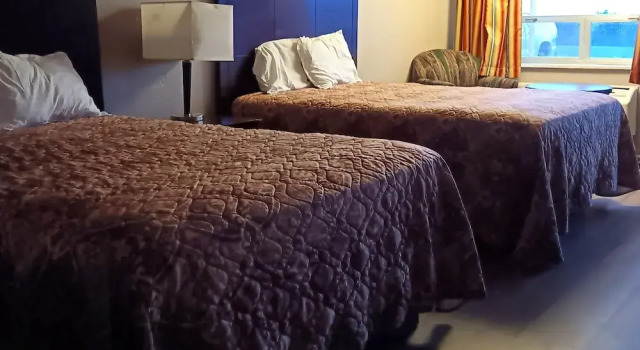 Четырёхместный номер Standard с балконом Sheldons Motel by OYO Keysville Near Hwy 360