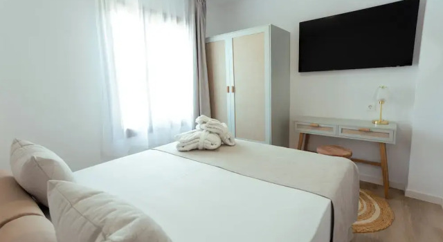 Кровать в общем номере Magic Pirates Island Resort