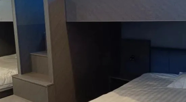 Кровать в общем номере Huoqiu Shuangyu Electric Gaming Hotel