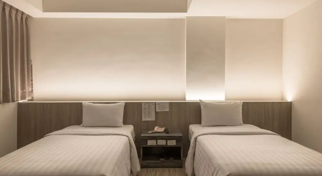 Номер Economy Lotus Yuan Business Hotel