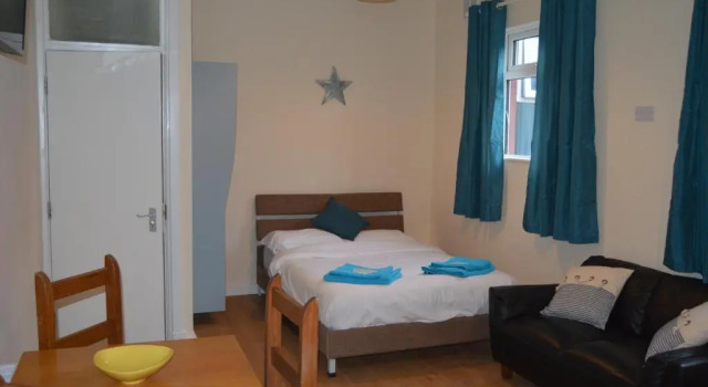 Апартаменты Deluxe Central Cove Guesthouse