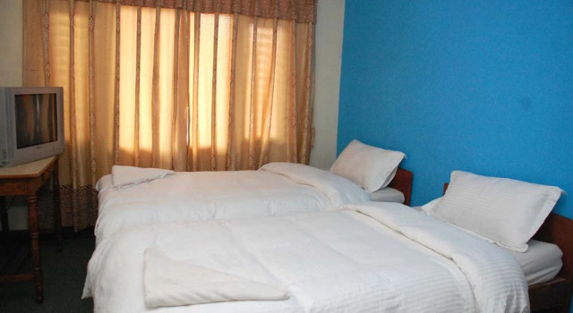 Кровать в общем номере Holyland Guest House