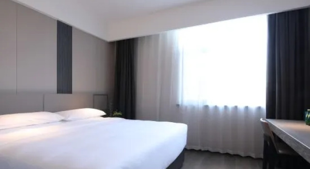 Семейный люкс с 2 комнатами Holz Riez Hotel (Near The Forbidden City , Marshal Zhang's Mansion and Liaoning Provincial Museum)?