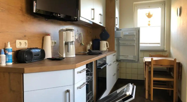 Апартаменты Wohnung 1 mit überdachte Terrasse zum Garten Nähe Strand und Hafen Bensersiel