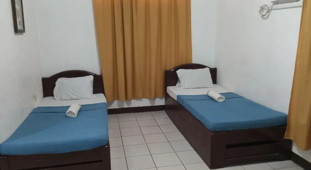 Номер Standard Pension Bacolod