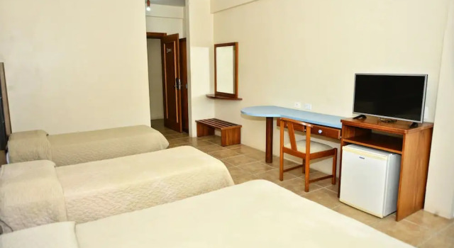 Четырёхместный номер Deluxe De Rose Praia Hotel