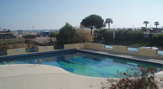 Lovely Flat With Side sea View and Swimming Pool, Забронировать Отель Бибионе-Пинеда Венето, рядом с Долина Вальгранде