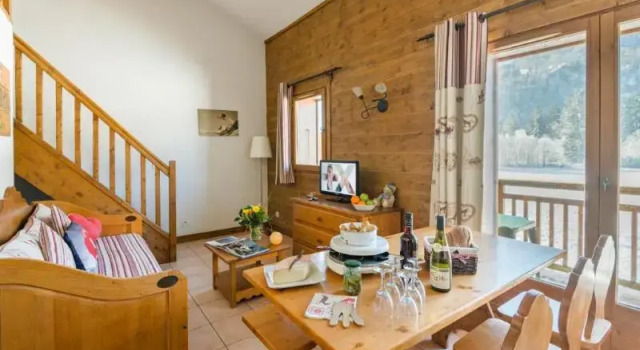 Кровать в общем номере Résidence Lagrange Vacances Les Fermes de Samoëns