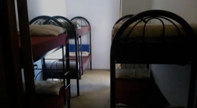 Кровать в общем номере Fourways Backpackers Lodge