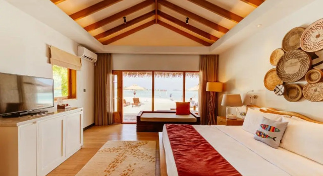 Бунгало Beach Cinnamon Dhonveli Maldives - Complimentary Speedboat Return for 2 pax on 7 nights or more stays valid to 31 Oct 2027 & up to 2 kids stay free