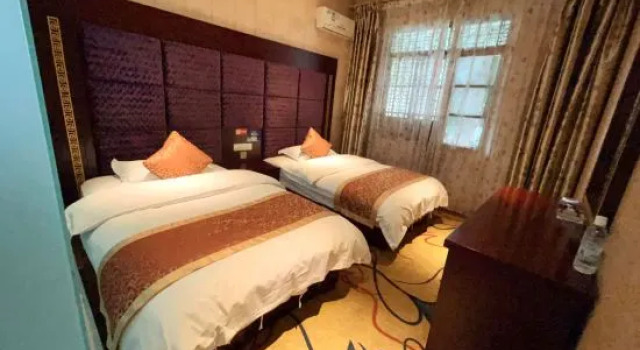 Люкс Deluxe Sanlong Hotel in Kaiyuan City