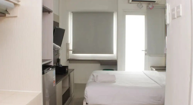 Студия Cozy And Warm Studio At Grand Sentraland Karawang Apartment