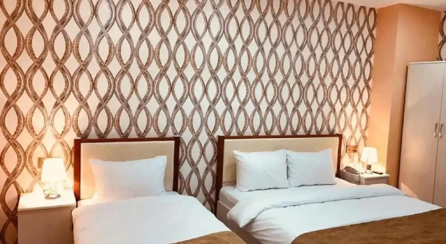 Standard triplă cameră North West Hotel