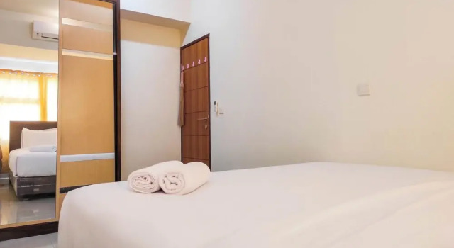 Апартаменты Standard Luxurious 1BR at Vida View Makassar Apartment By Travelio