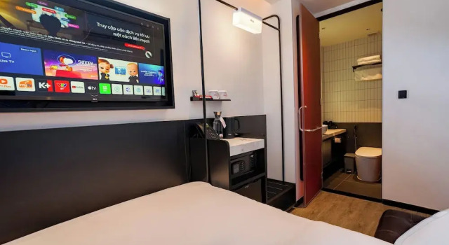 Номер Comfort The Signature Hotel Saigon