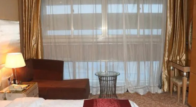 Семейный люкс Zheng Tai He East Hotel