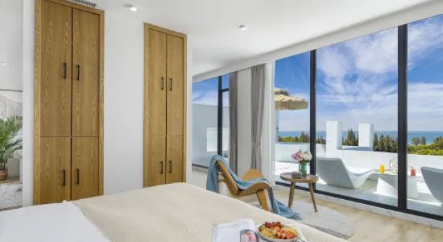 Семейный люкс с балконом Fansu Qihai'an Qingshe Seaview Homestay (Weizhou Island Shop)
